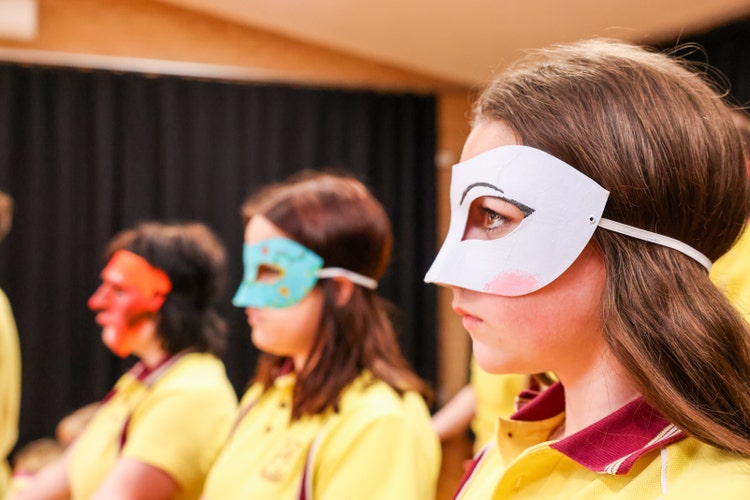A group of girls wearing masks