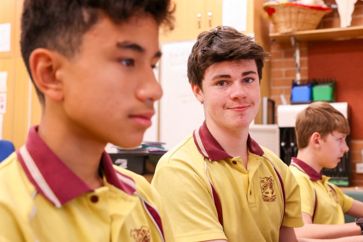 A group of boys in a classroom